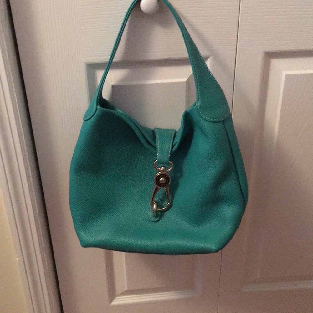 Beautiful Dooney & Bourke turquoise purse - never used